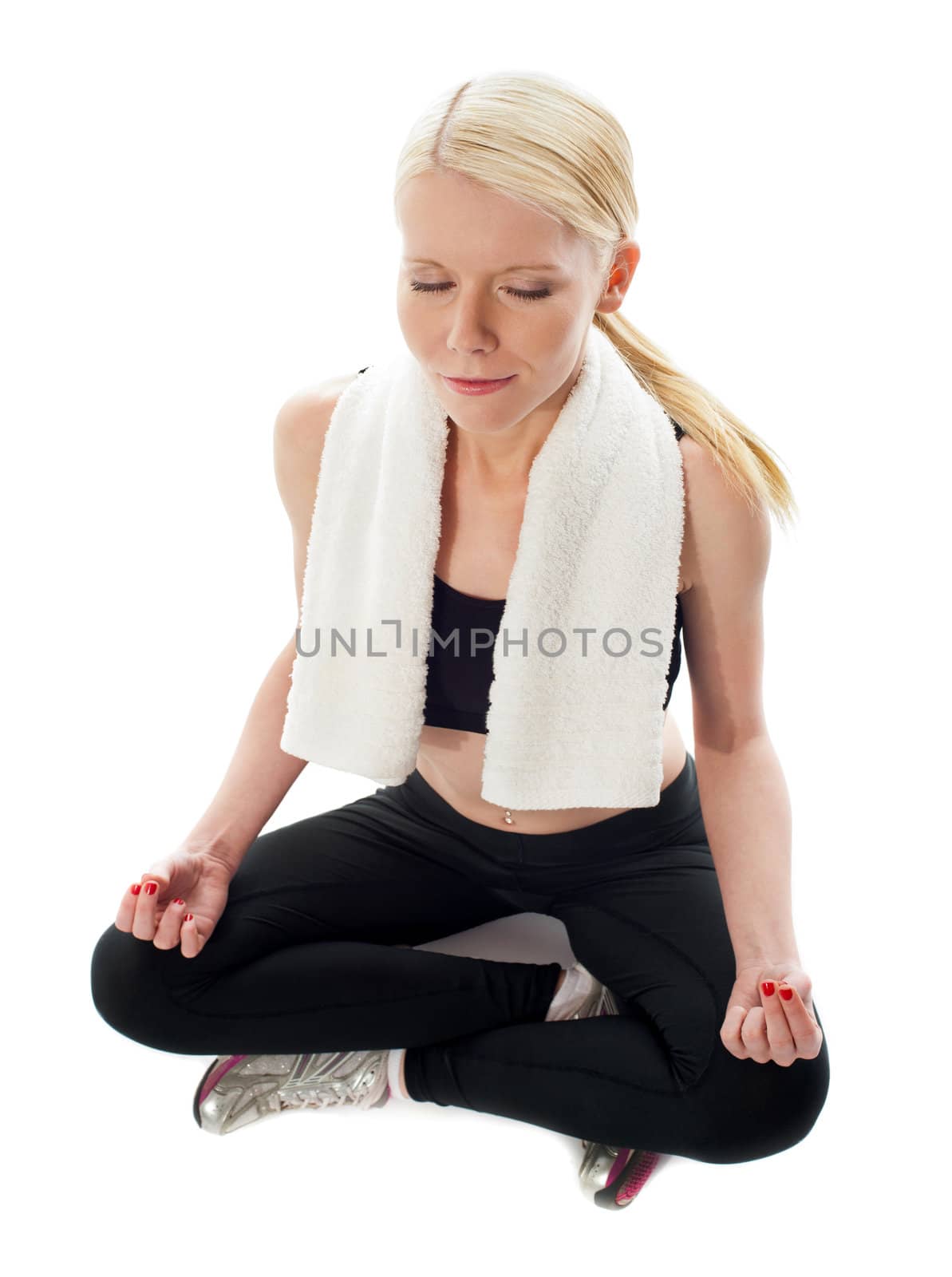 Top View of a woman meditating on isolated white