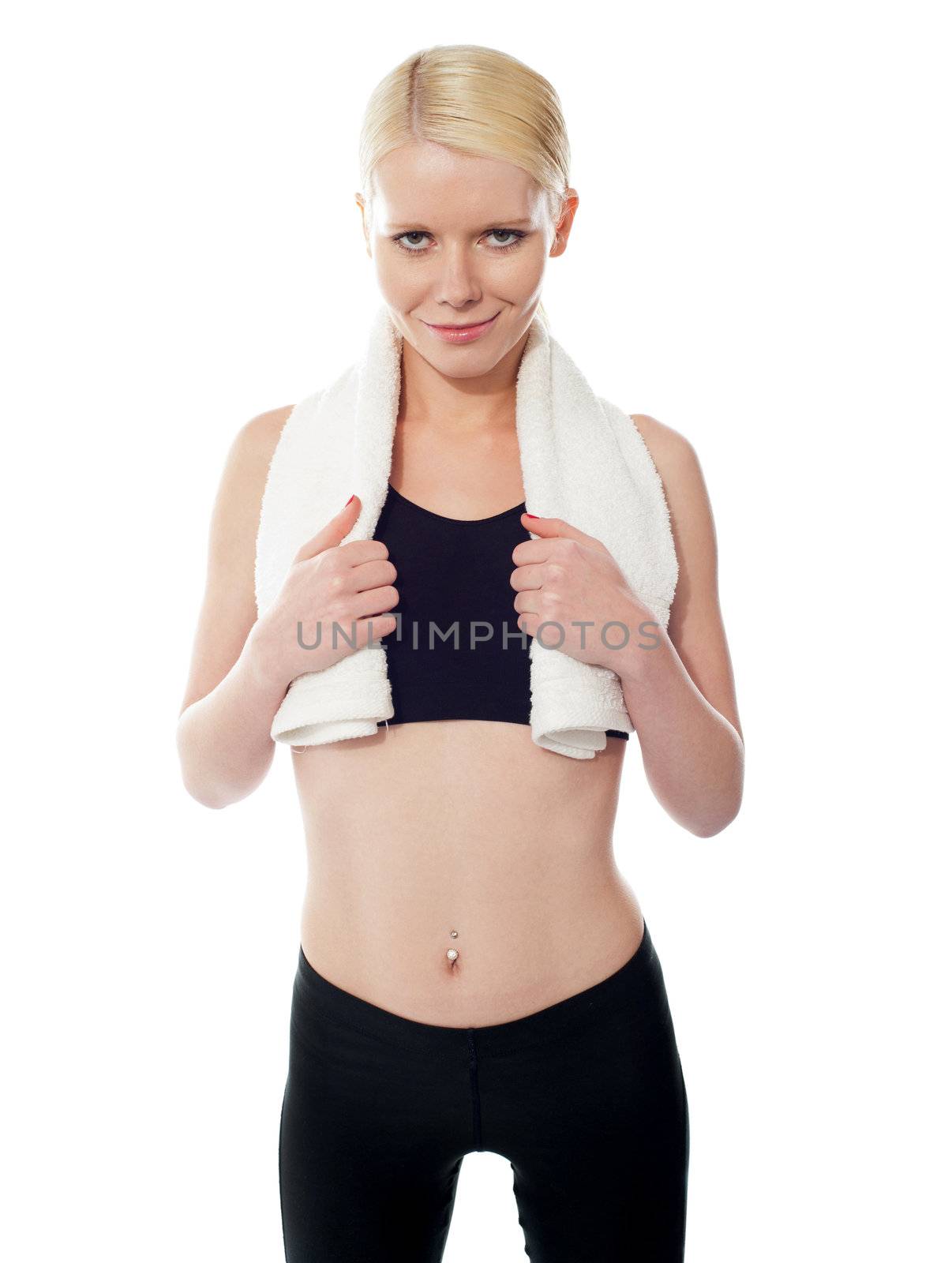 Young happy woman in sports wear by stockyimages