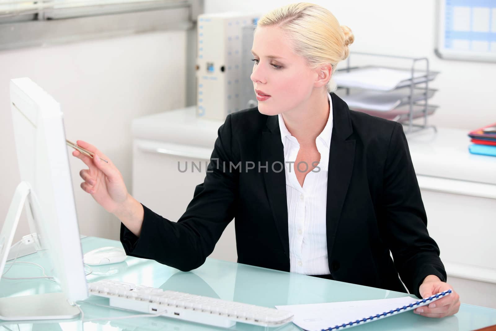 Blond businesswoman at work