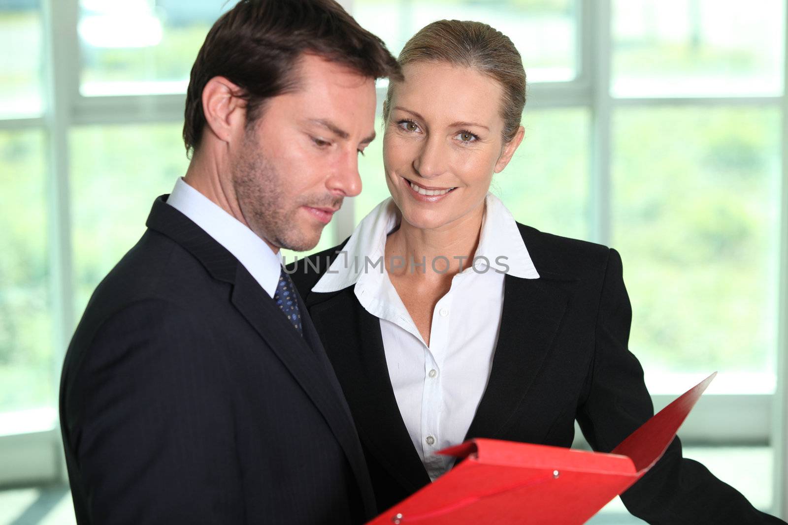 Businessman looking at paperwork.