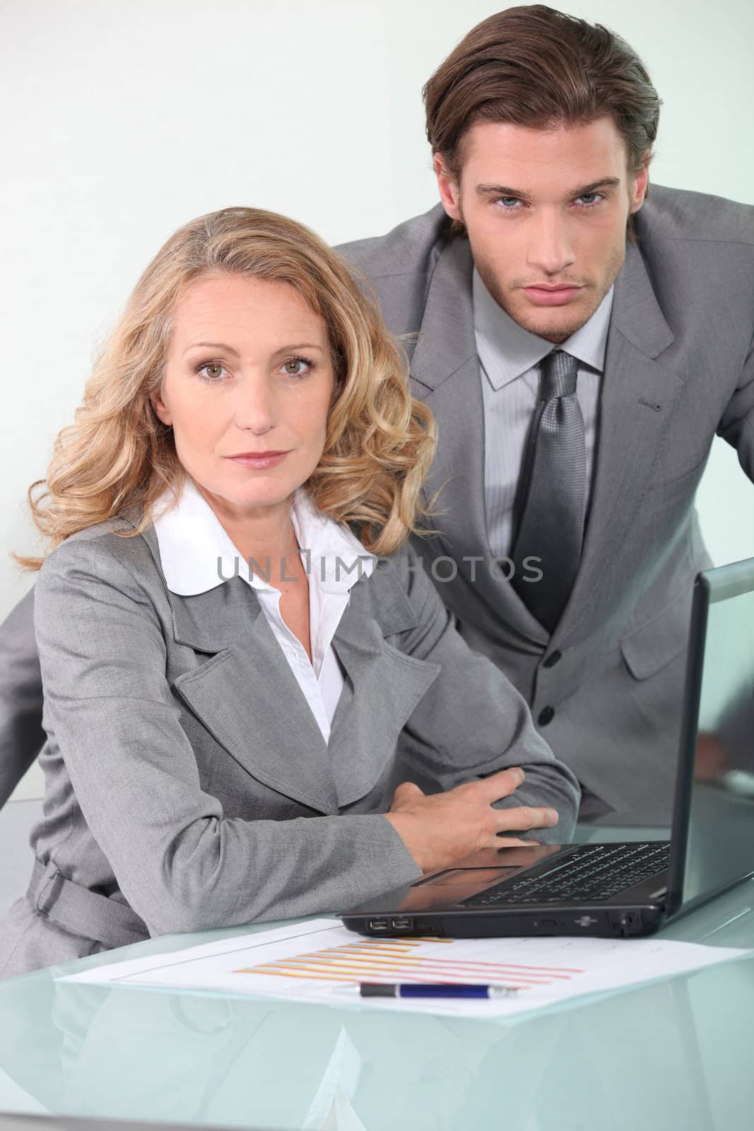 Businessman and woman by phovoir