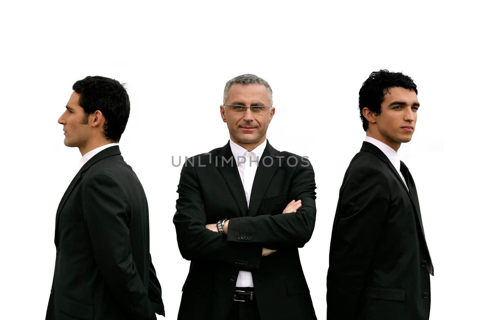 Three confident men standing on white background