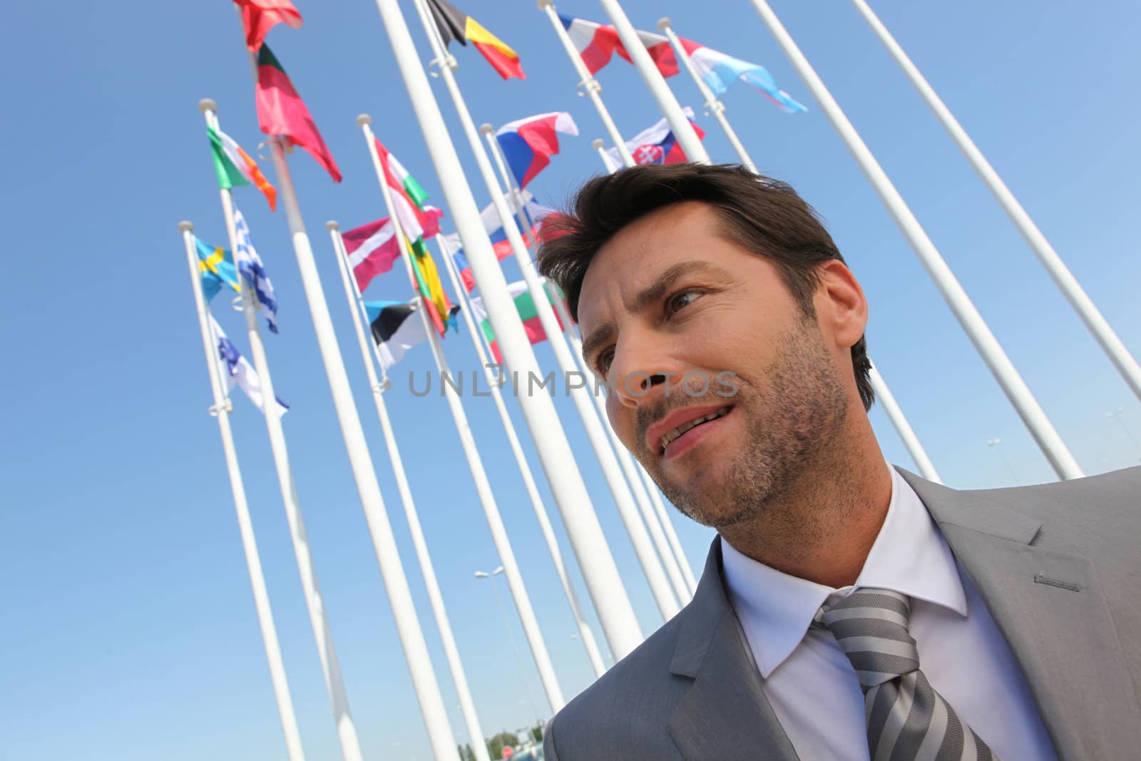 Businessman with flags.