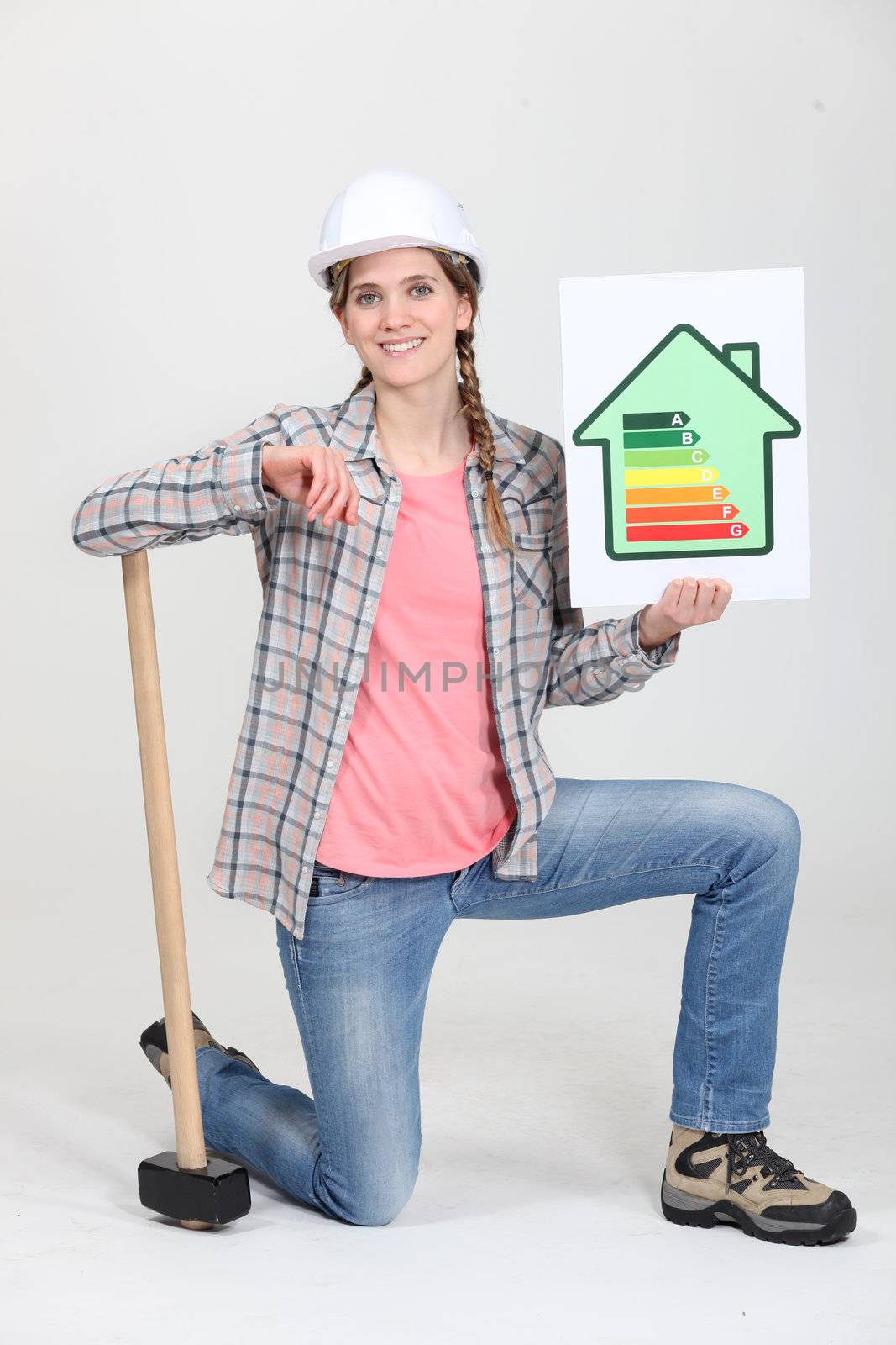 A female construction worker promoting energy savings.