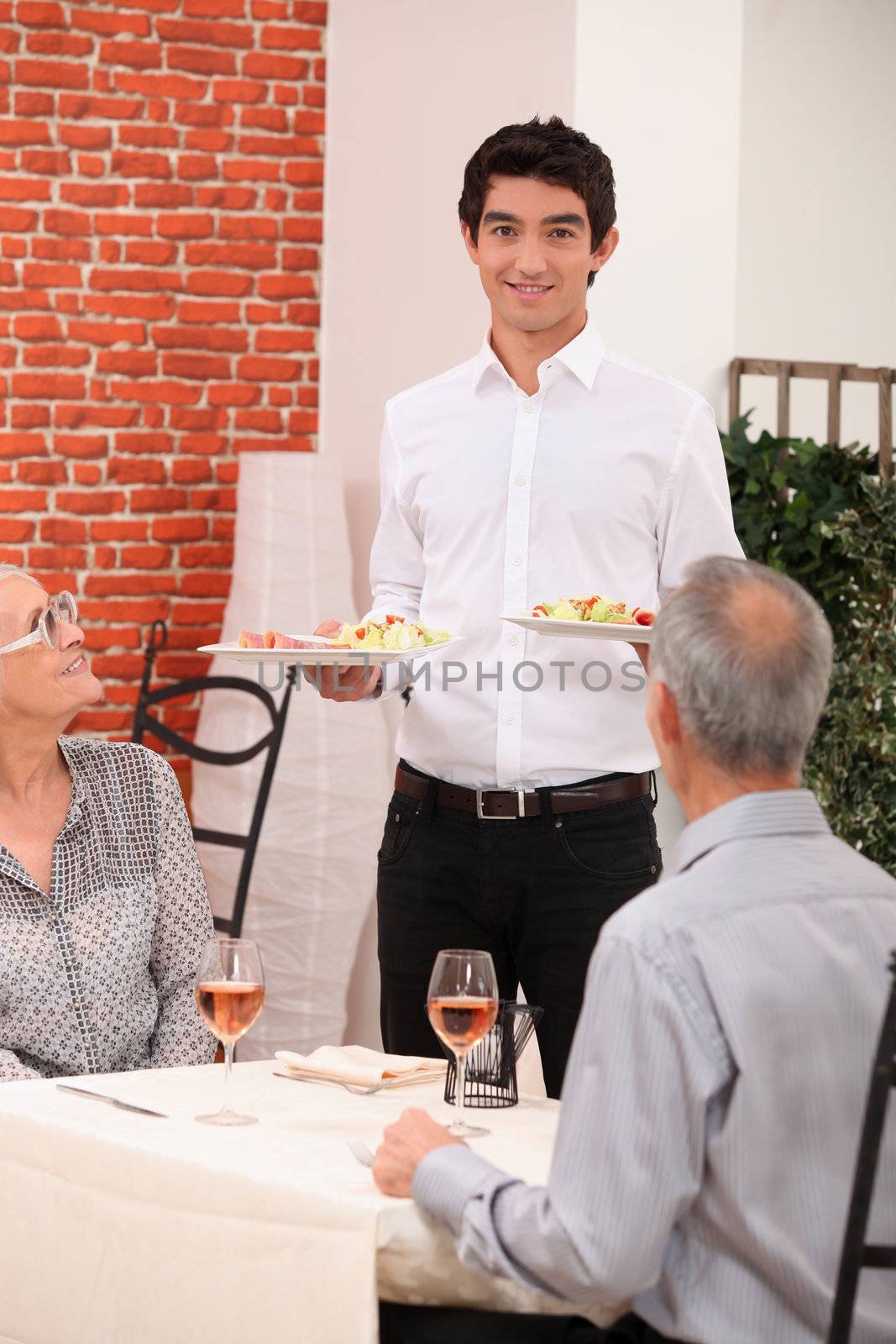 Senior couple dining in restaurant