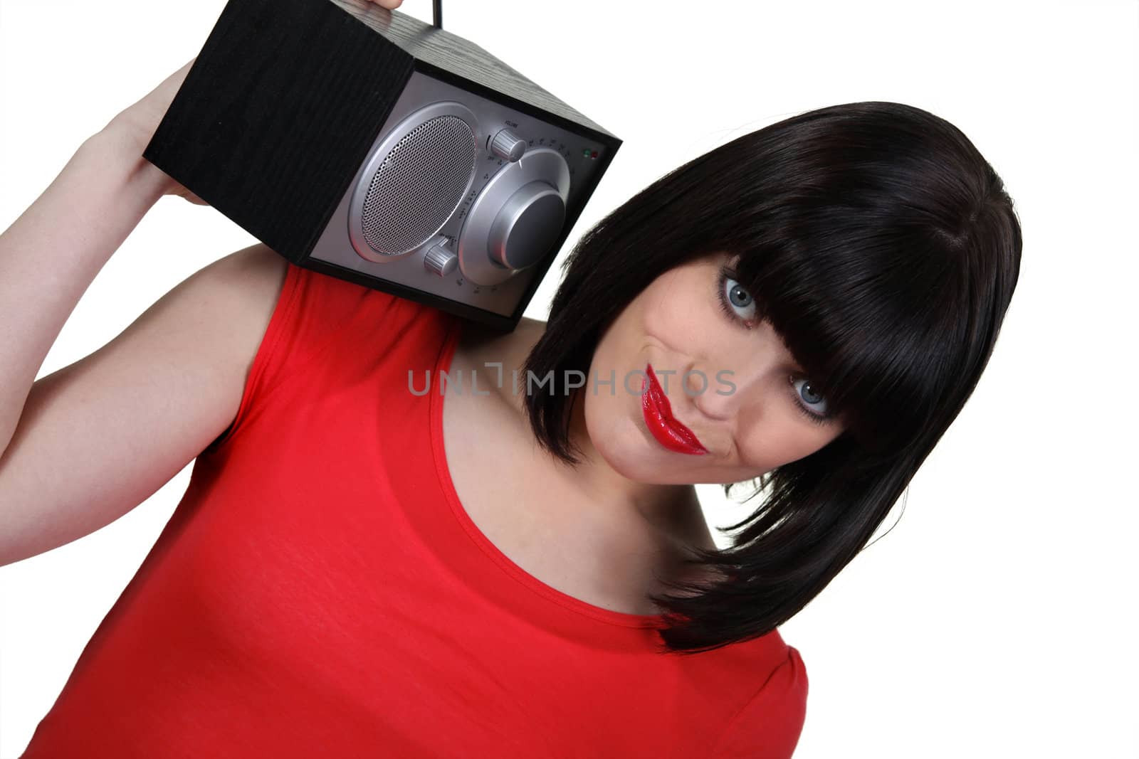 Brunette carrying radio over shoulder
