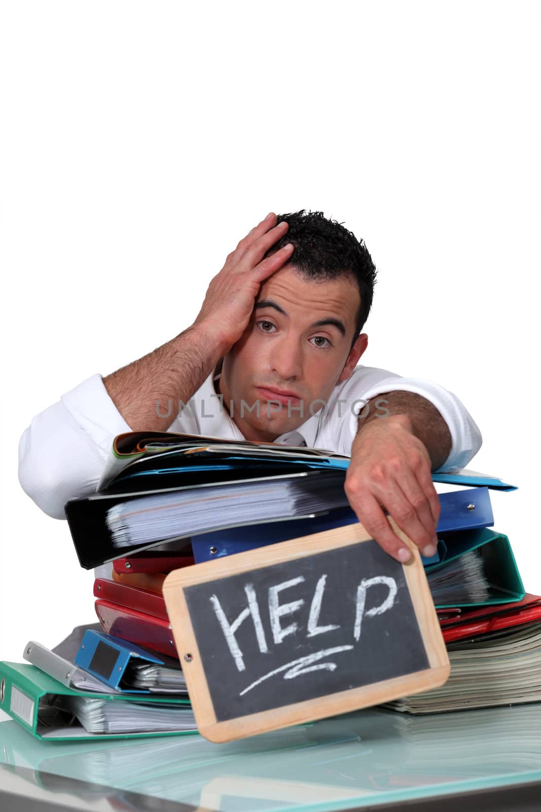 Office worker with a sign asking for help