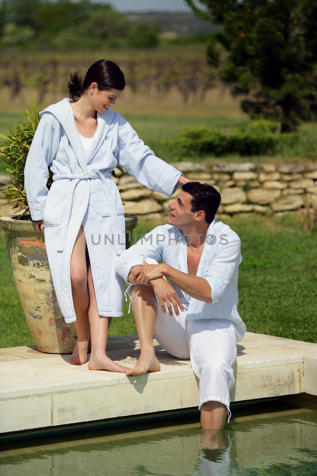 Couple poolside