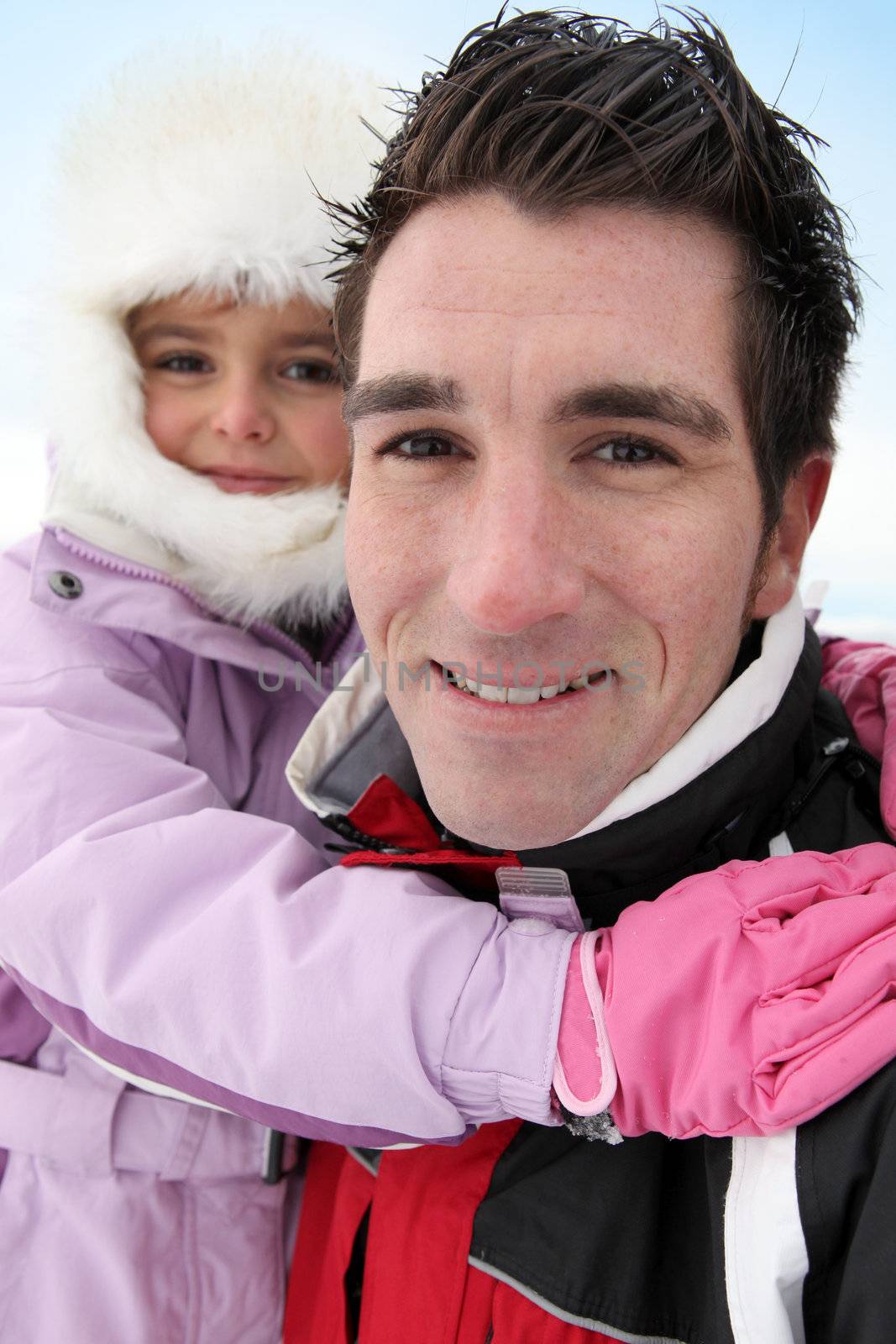 father and daughter at ski