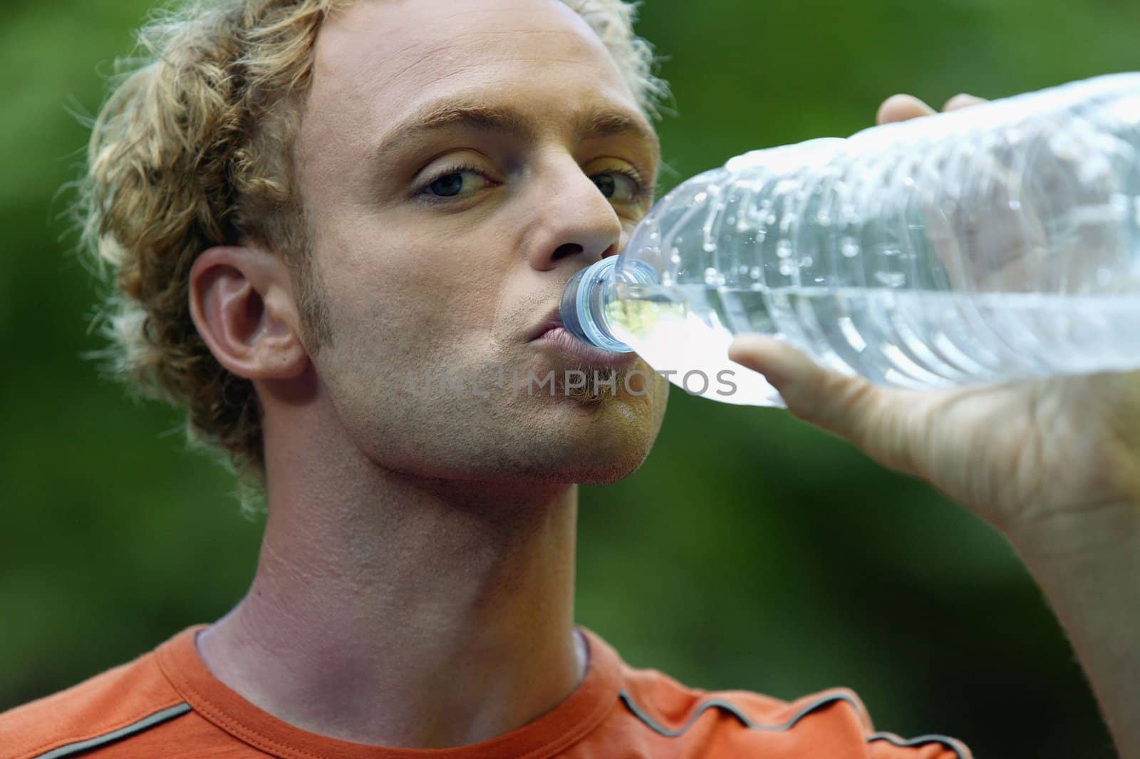 Man hydrating after outdoor run