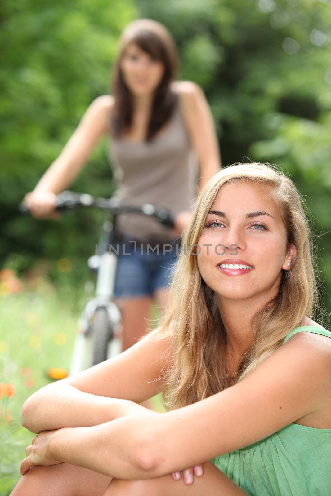 Two teenage girls in the countryside