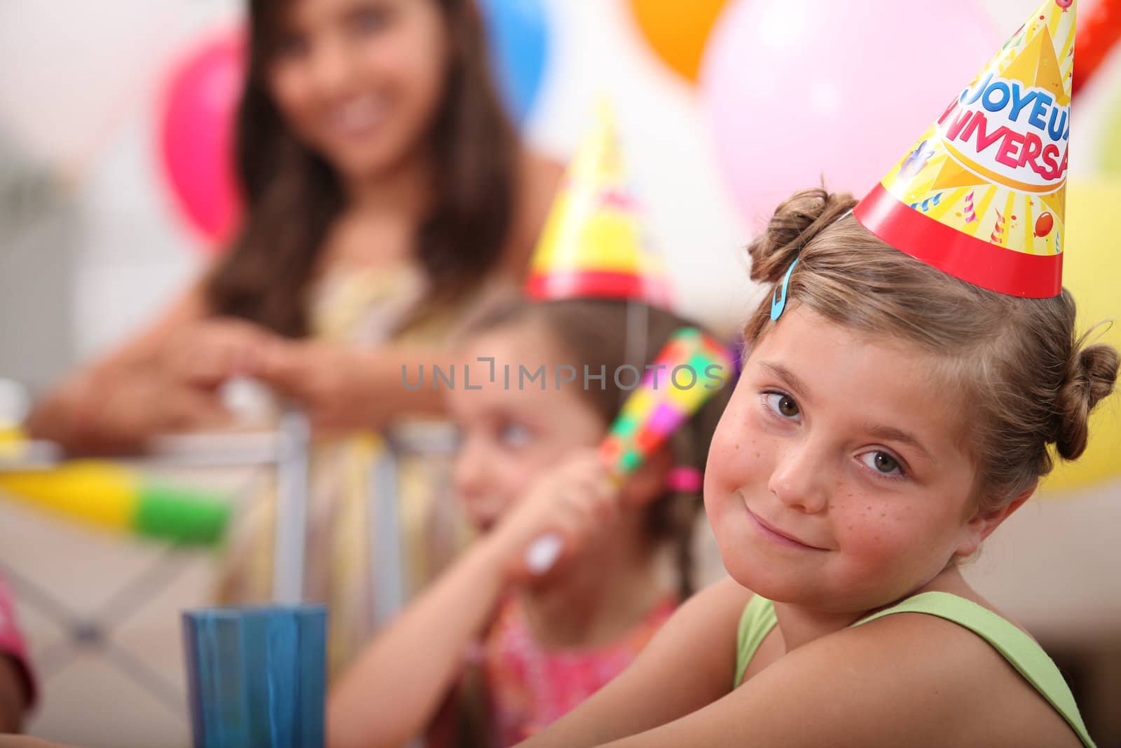 Little girl at birthday by phovoir