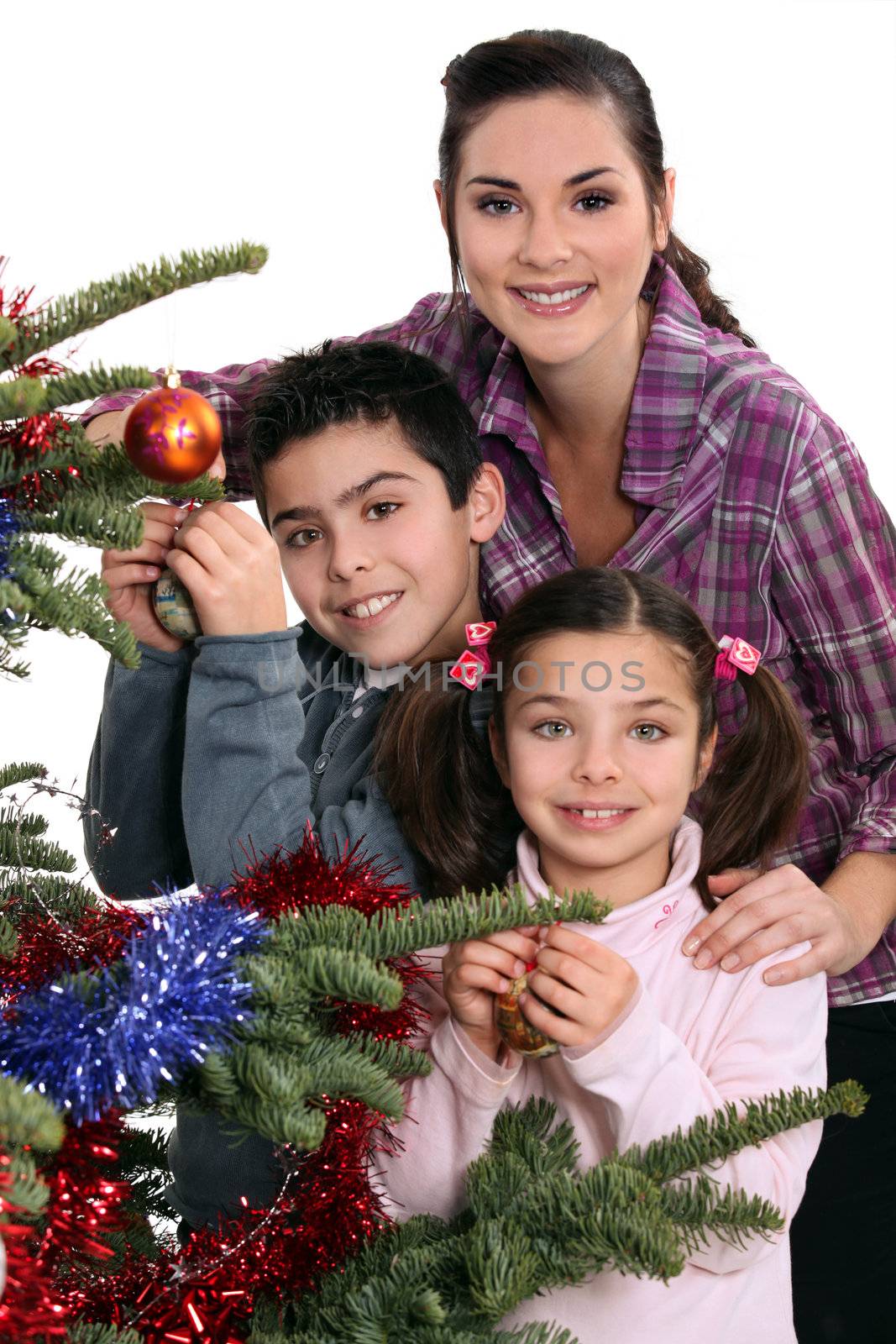 Family celebrating Christmas together by phovoir