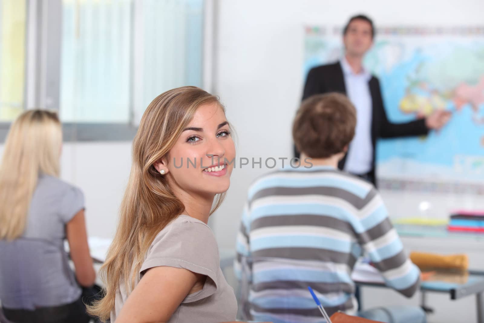 students in classroom by phovoir