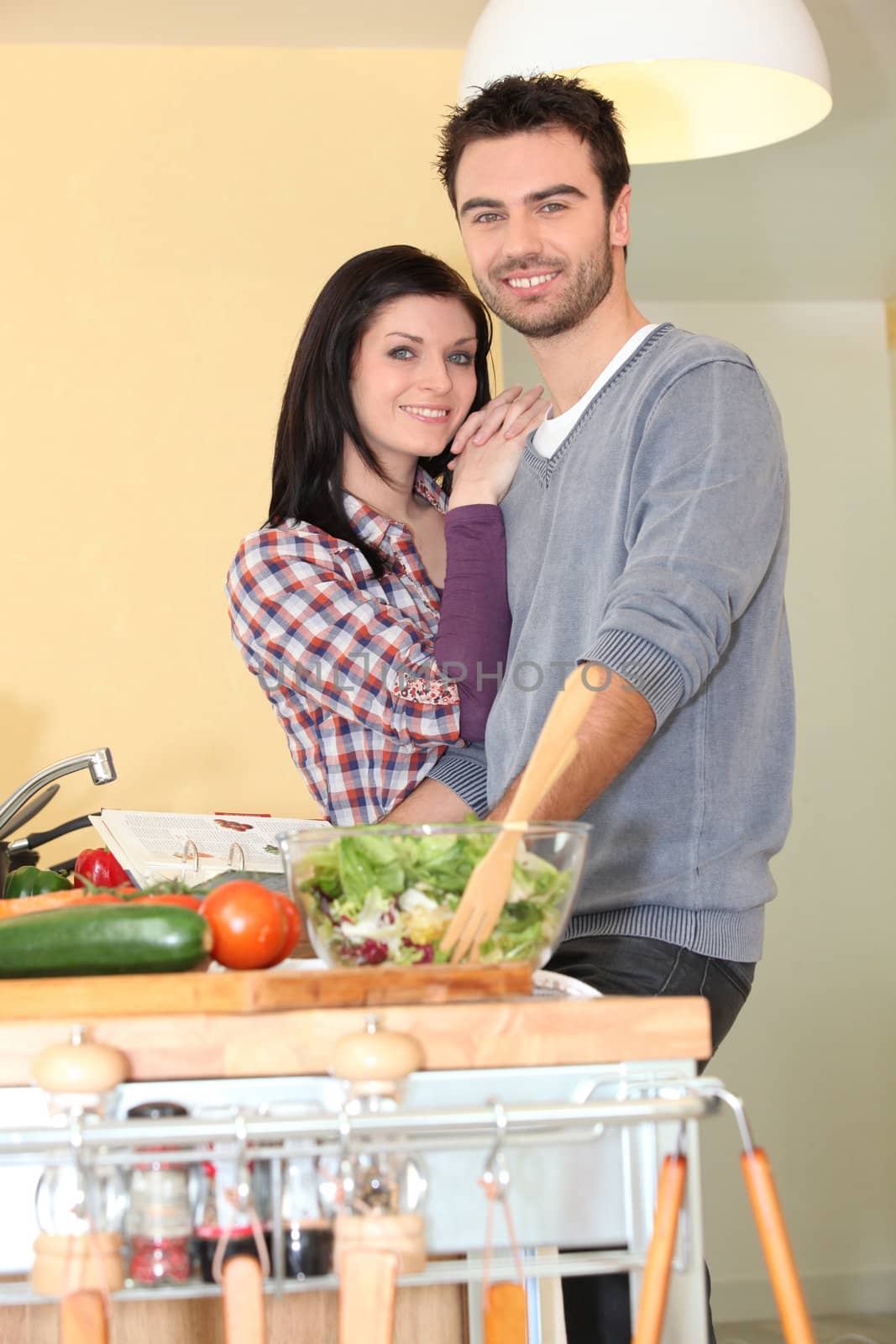 Smiling couple in kitchen