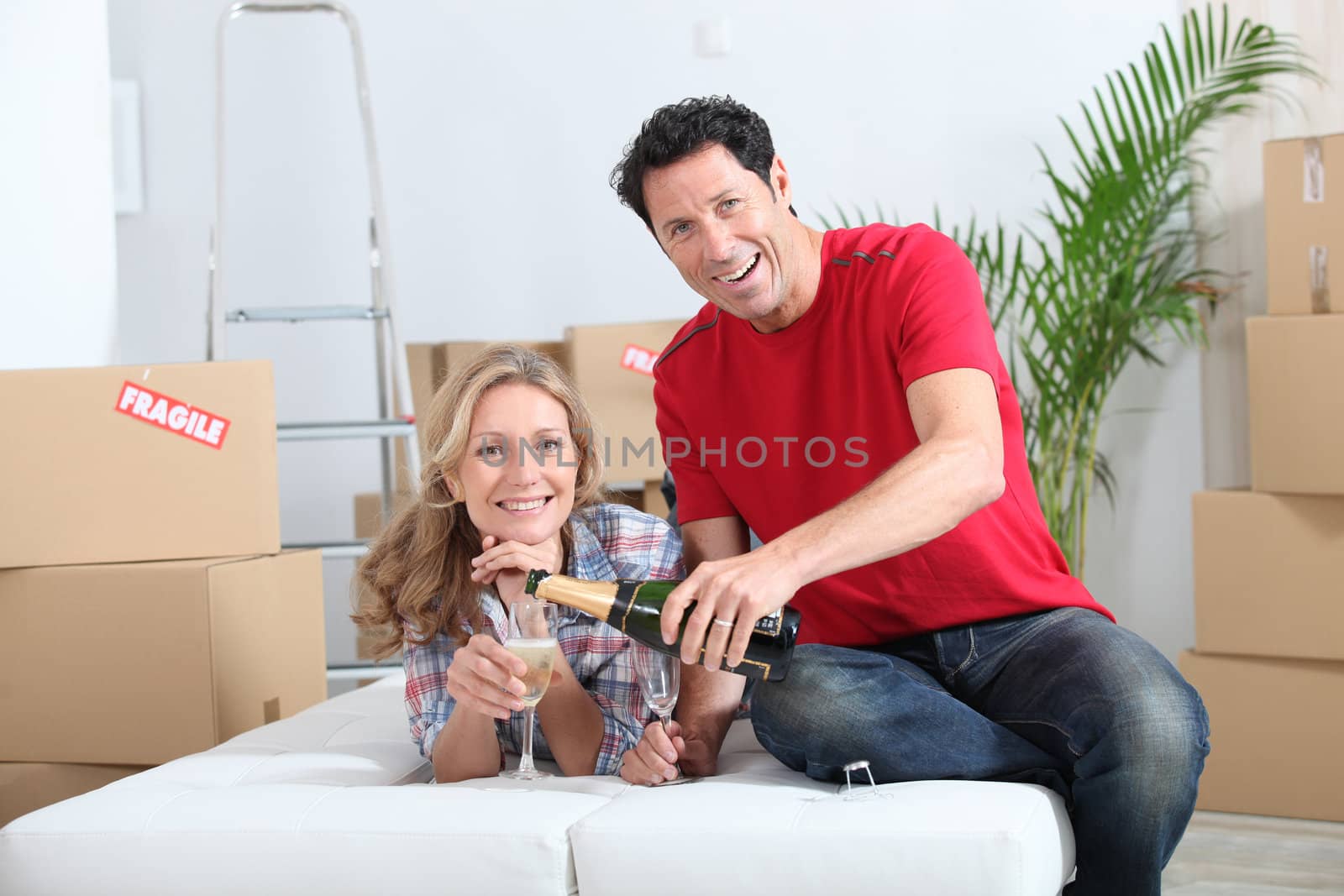 Couple celebrating new home