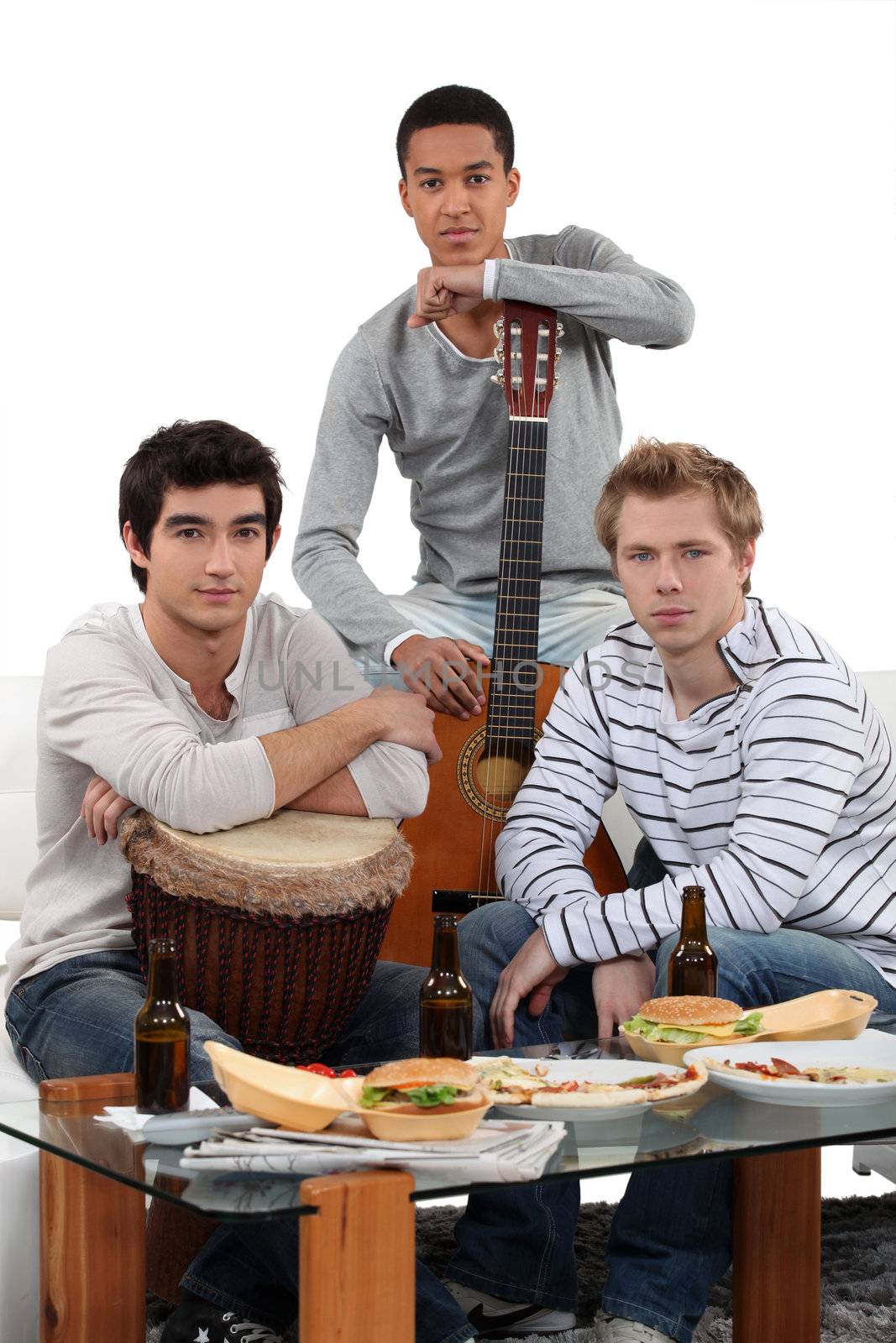 Young men with musical instruments