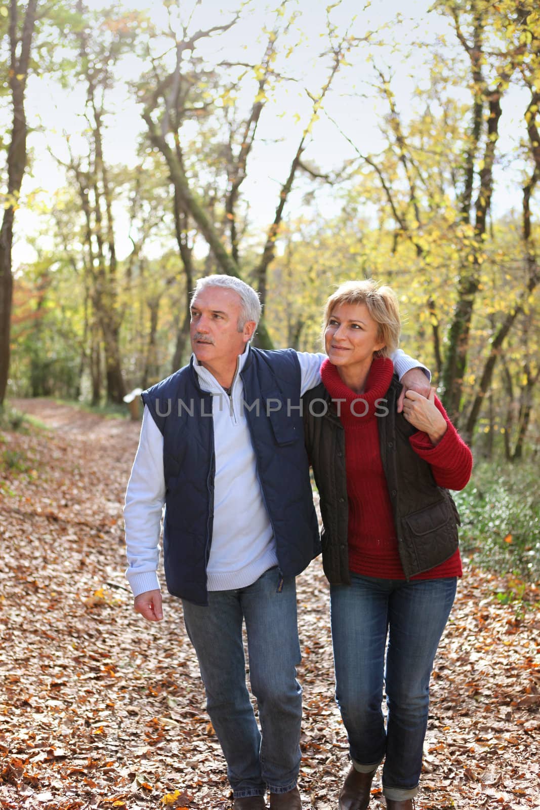 Couple taking romantic stroll in the park