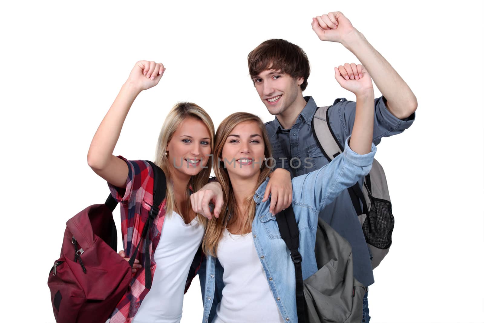 students with arms up