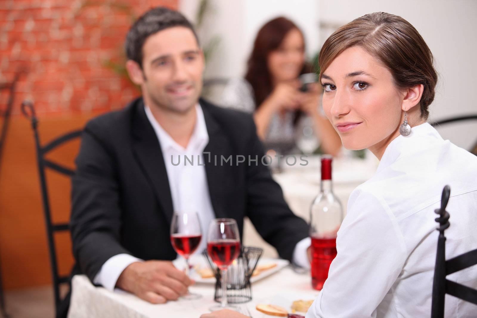 Couple having meal in restaurant