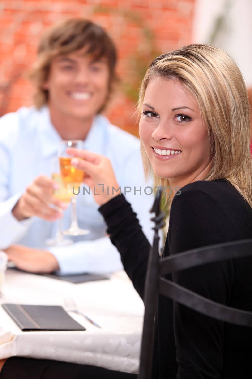 portrait of a couple at restaurant