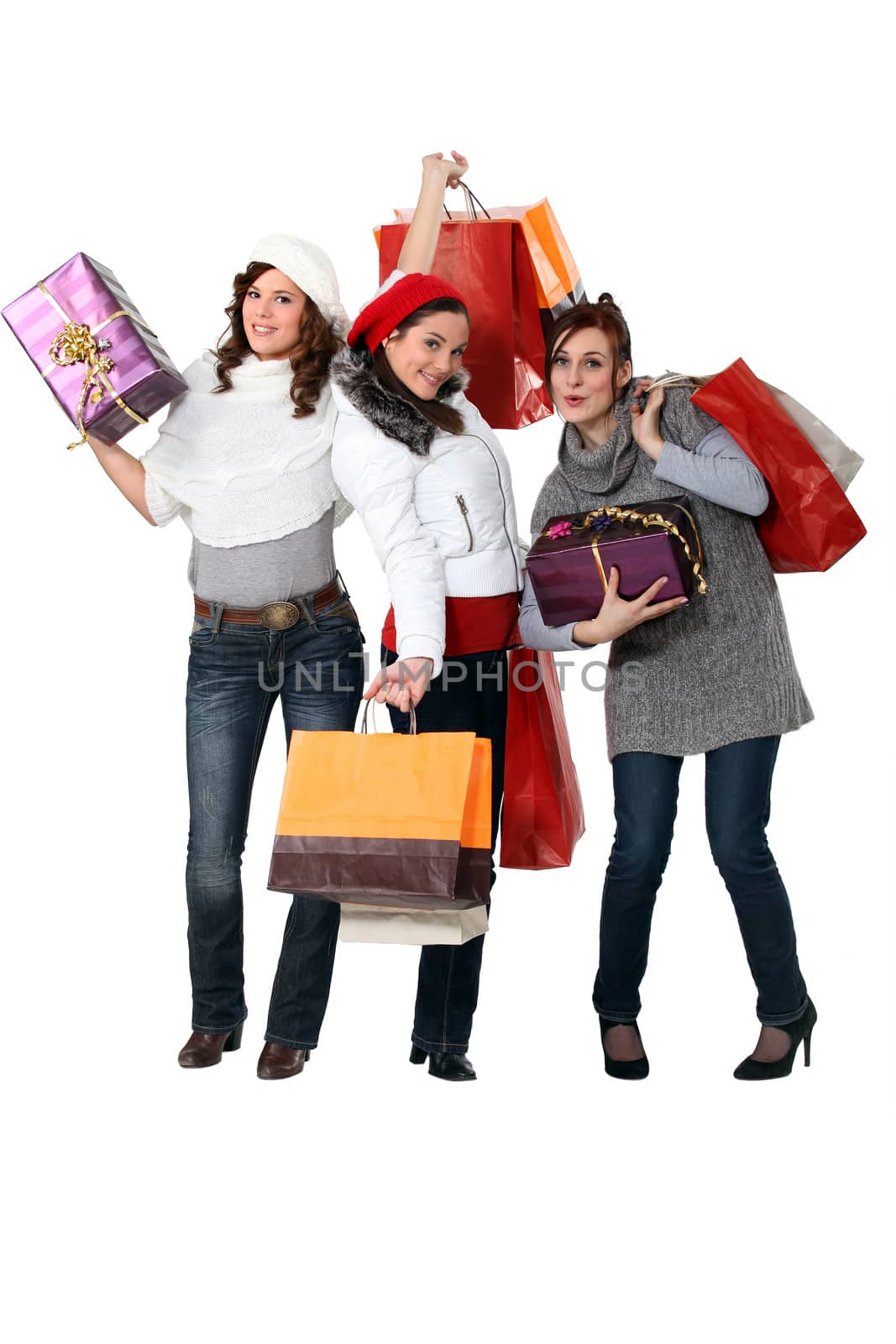 Women carrying bags and gifts