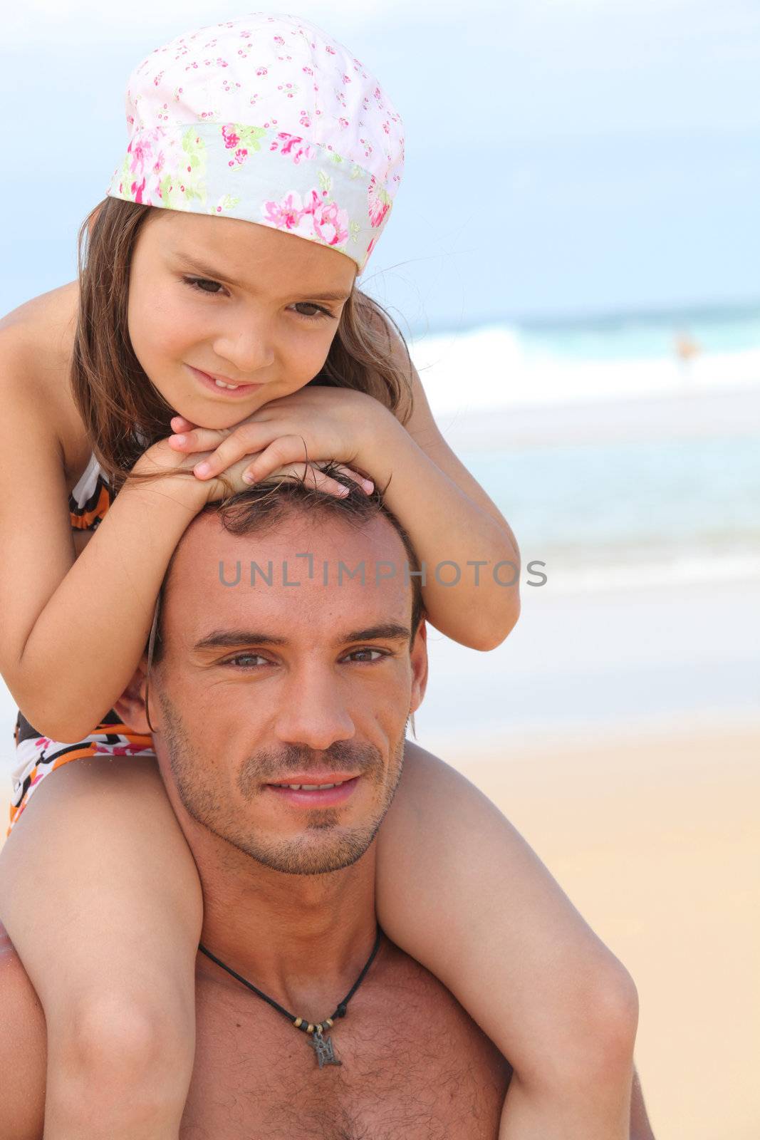 dad and daughter at beach