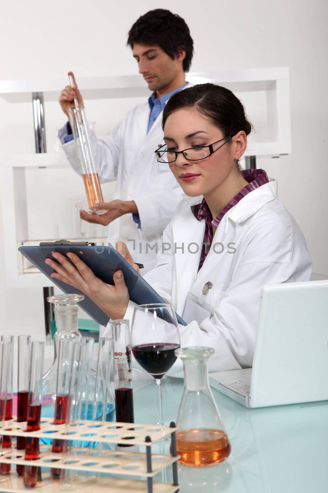 Wine experts in a lab