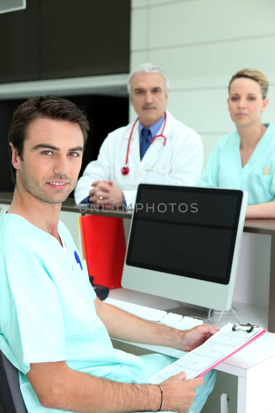 Doctors gathered around reception