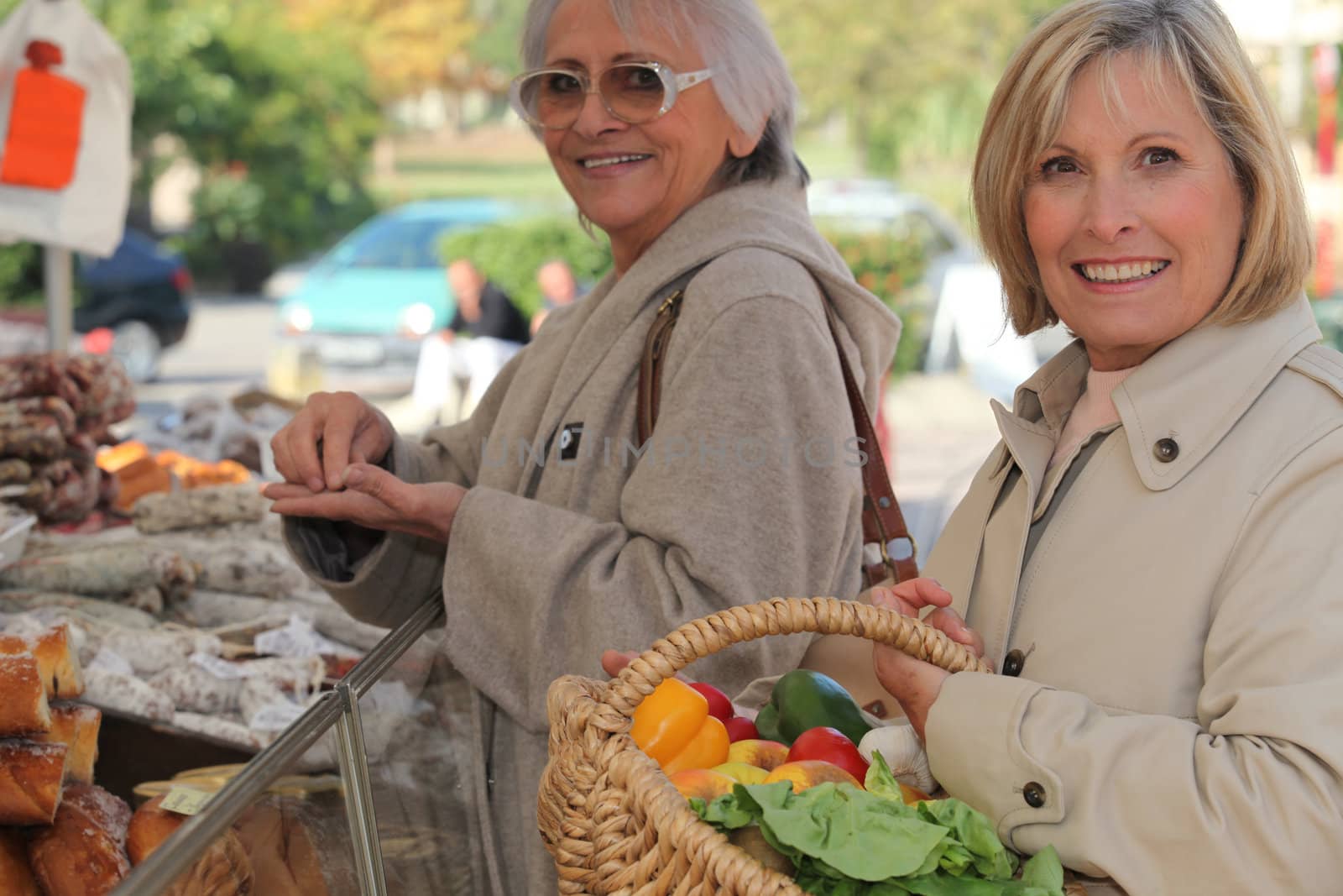 Mother and daughter shopping at the market together