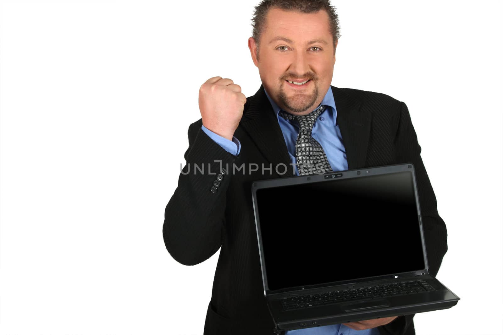 Businessman holding laptop