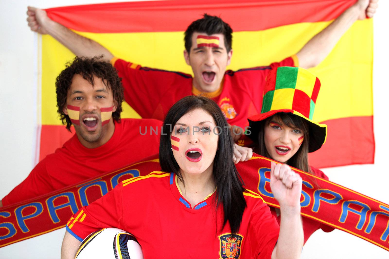 A group of people show their support of the Spanish football team