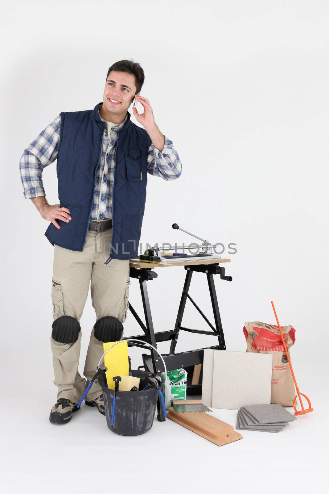 craftsman talking on his cell
