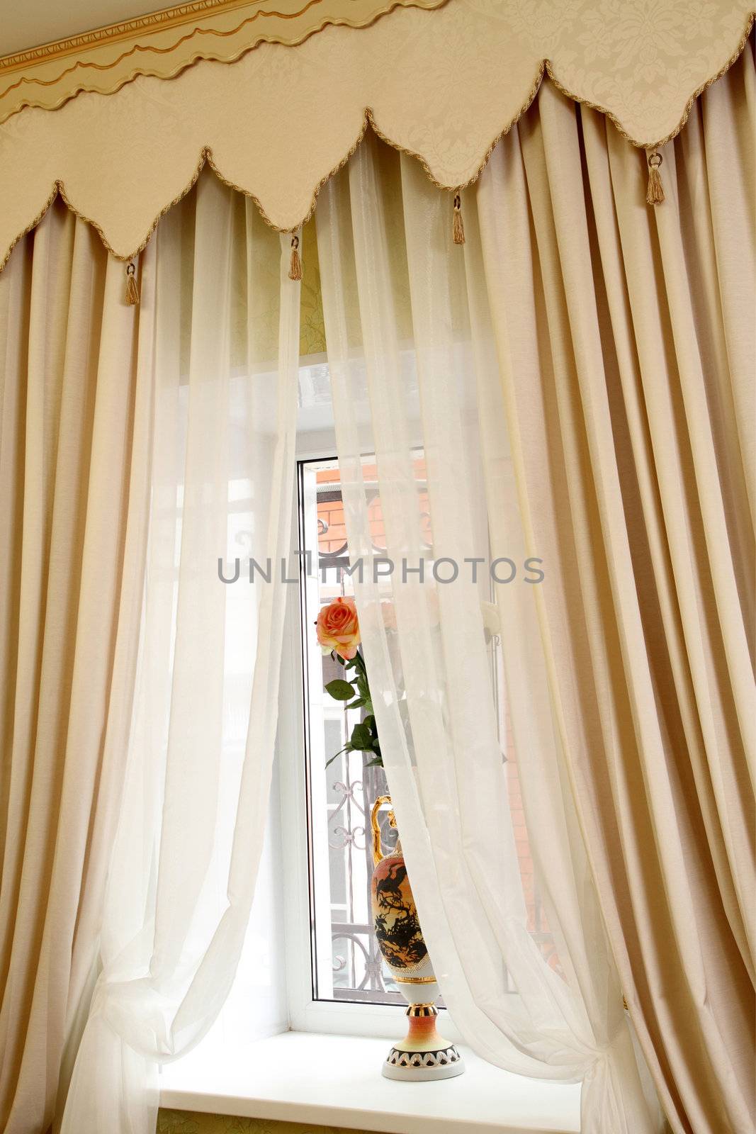 the windows decorated with curtains with a machine embroidery, double 13