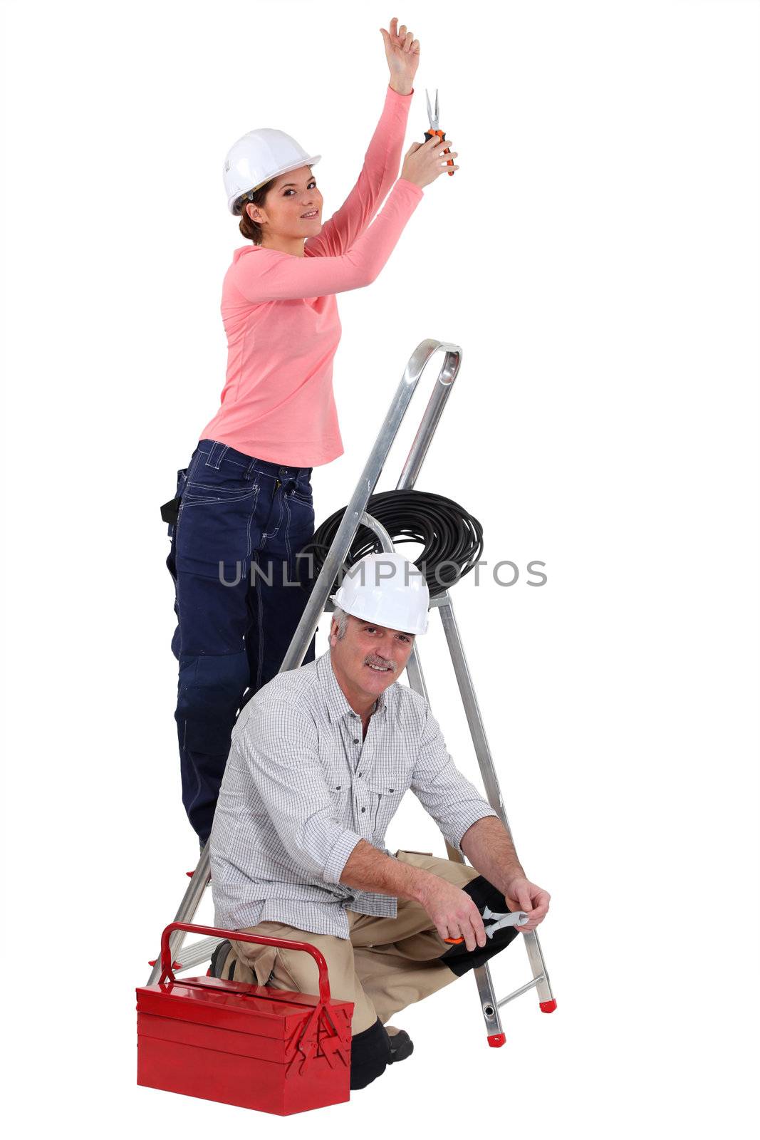electricians working together