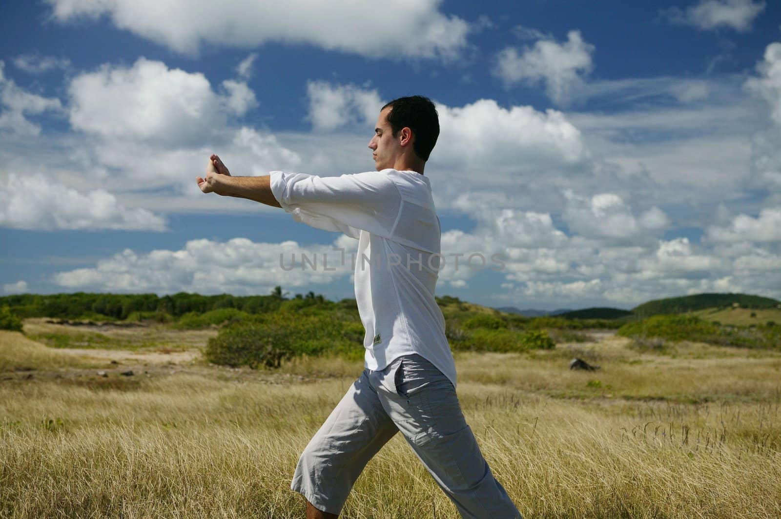 Man meditating in the countryside