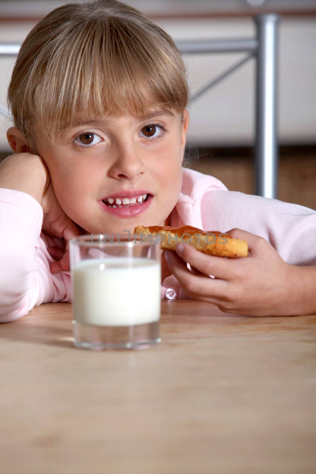 Girl with toast and milk