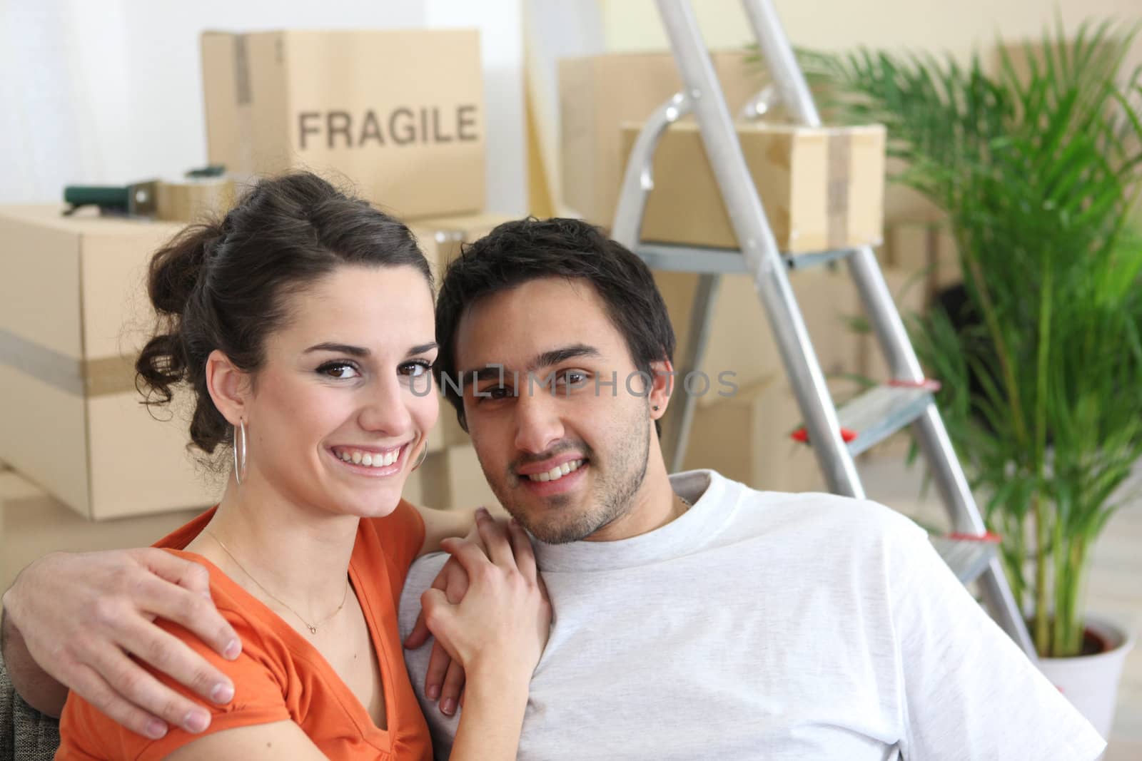 Young couple moving into first home