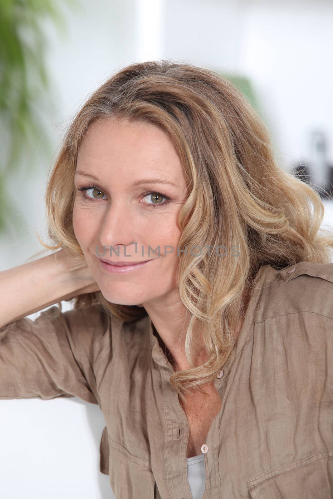 Profile of blond woman smiling