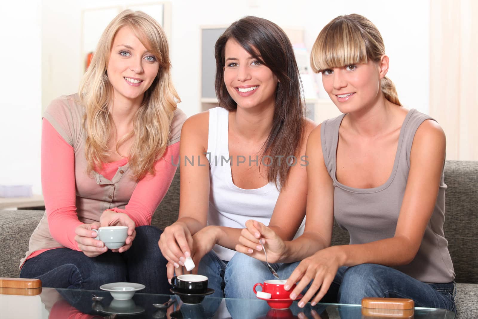 portrait of three women at teatime
