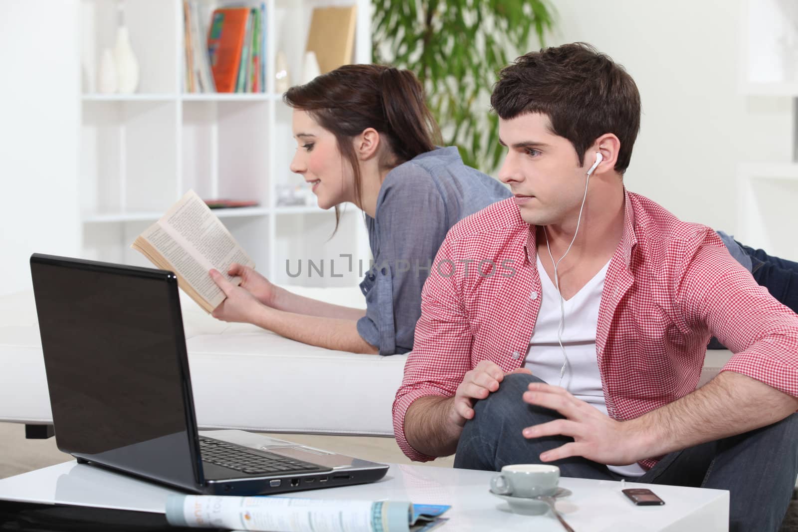 Couple relaxing at home