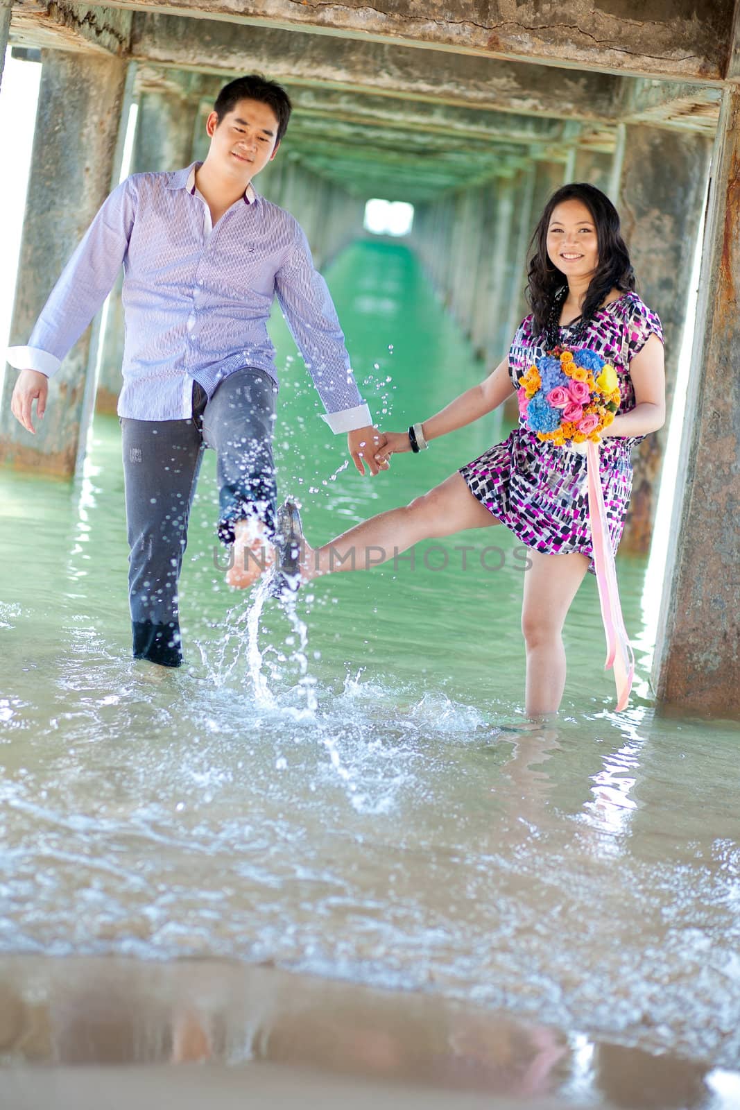 concept of happiness couples on the beach by vichie81