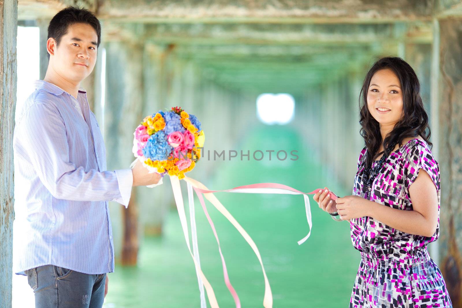 couples with beautiful bouquet