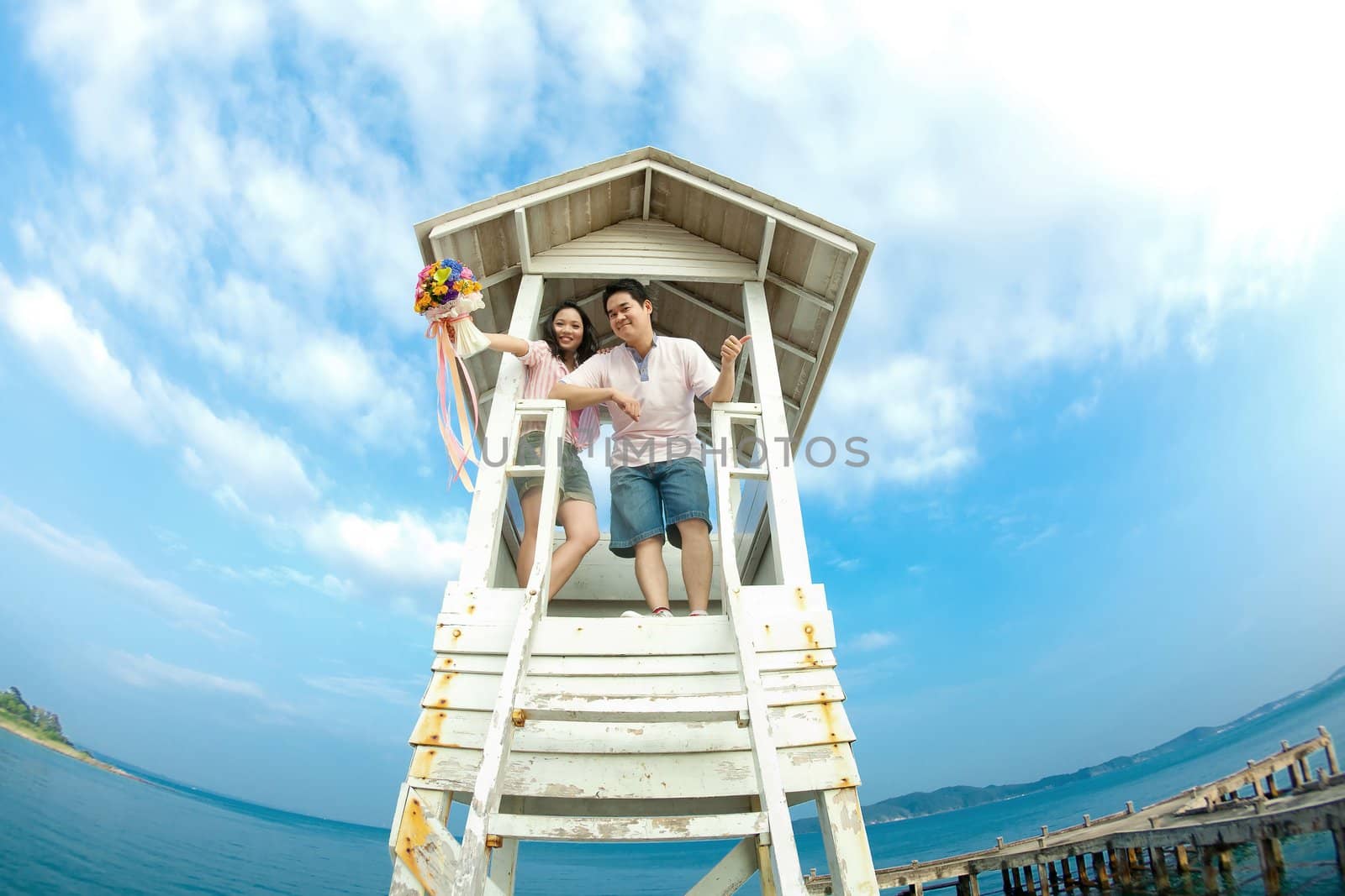 happiness couples with blue sky