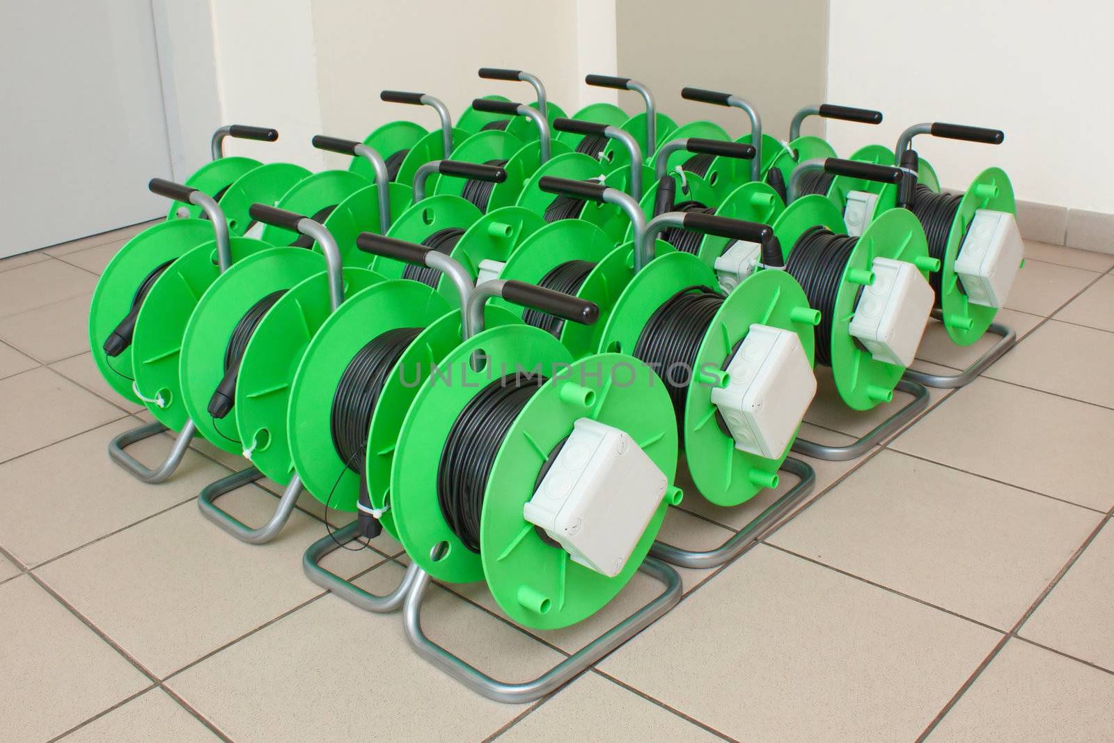 Group of cable reels for new fiber optic installation by artush