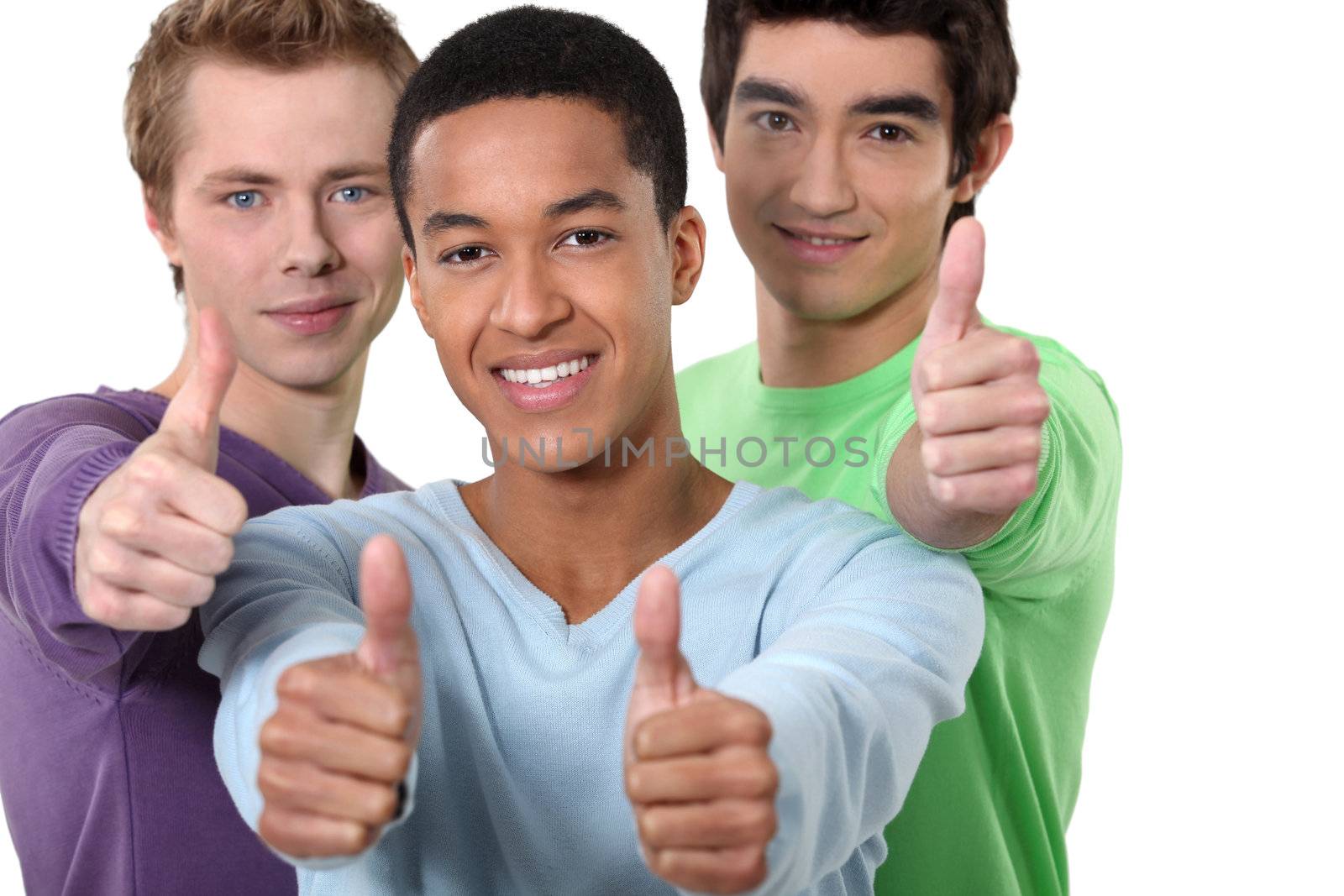Three male friends giving thumbs-up