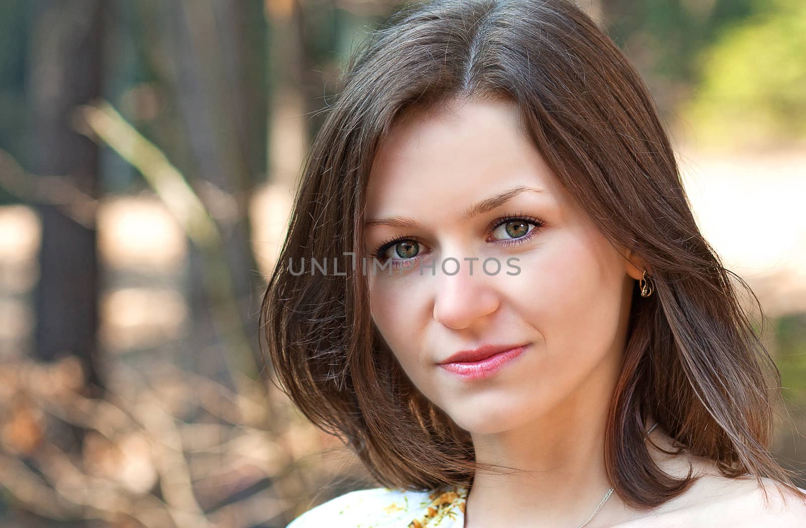 Portrait  of a young Czech woman in a little wood of Moravia.