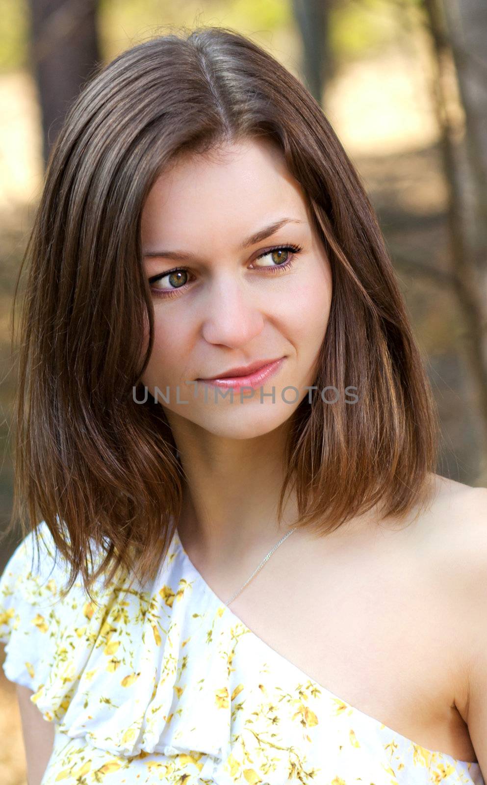 A young Czech woman in a little wood of Moravia.