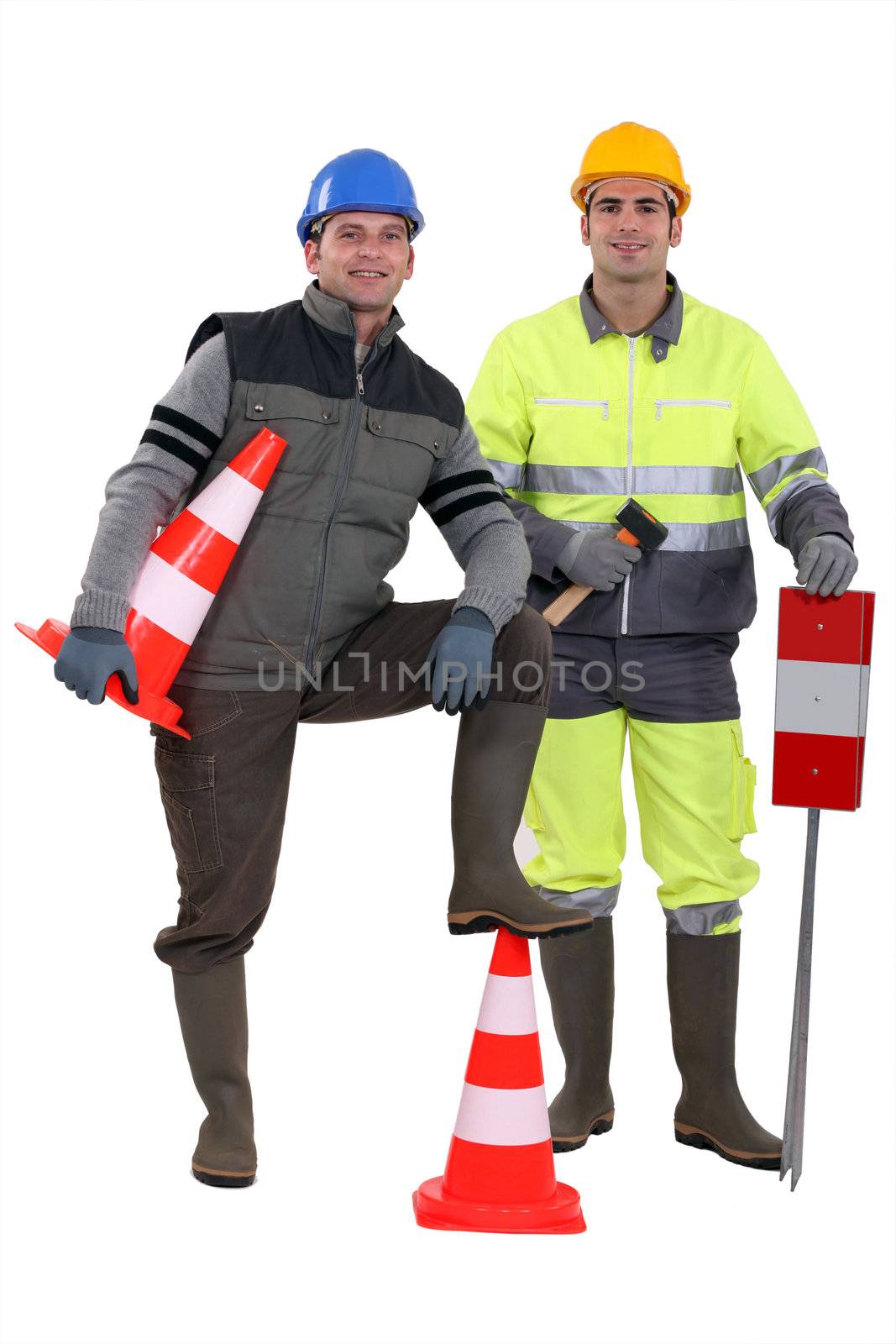 two road workers posing together by phovoir