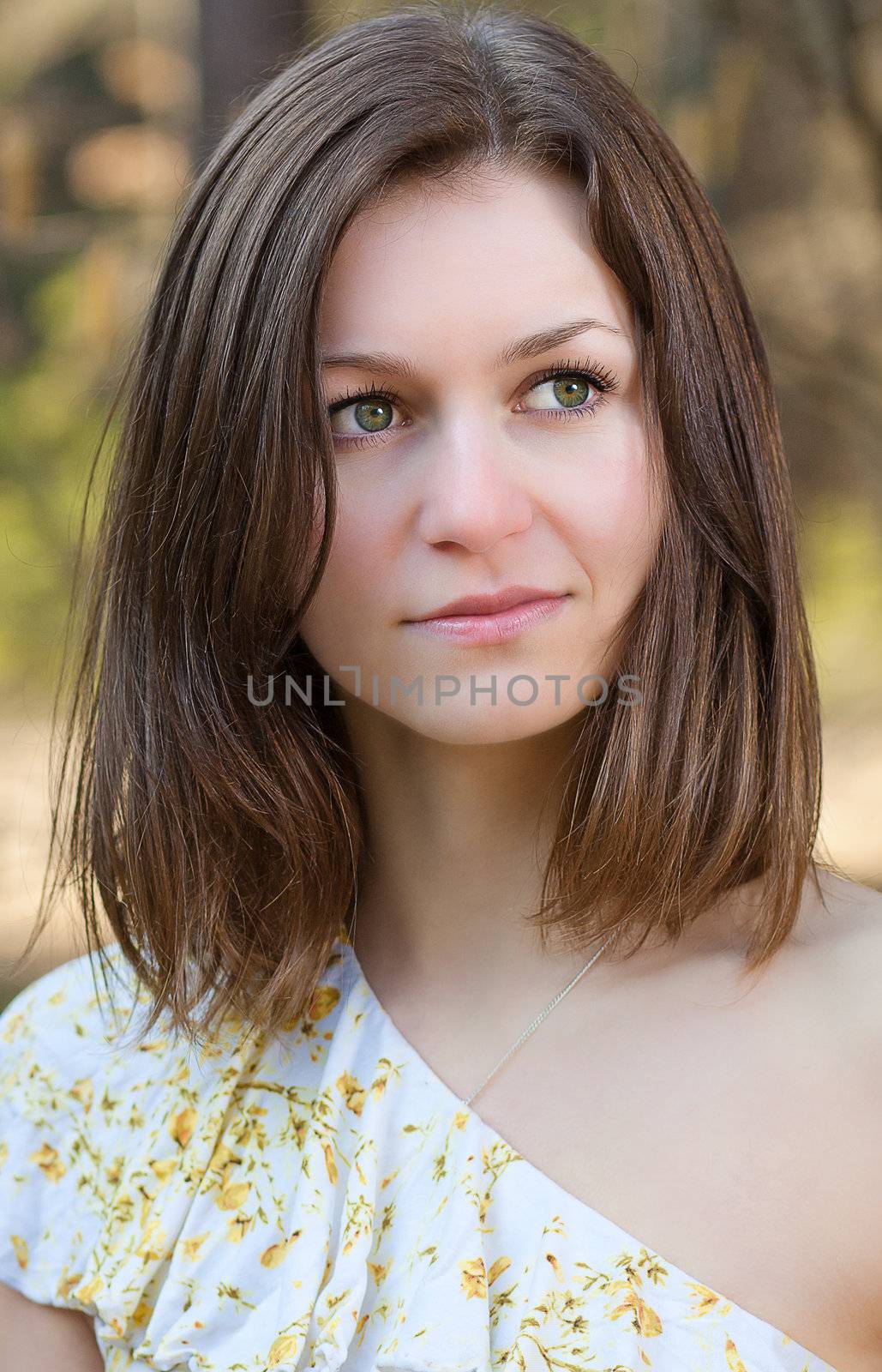 Portrait  of a young Czech woman in a little wood of Moravia.